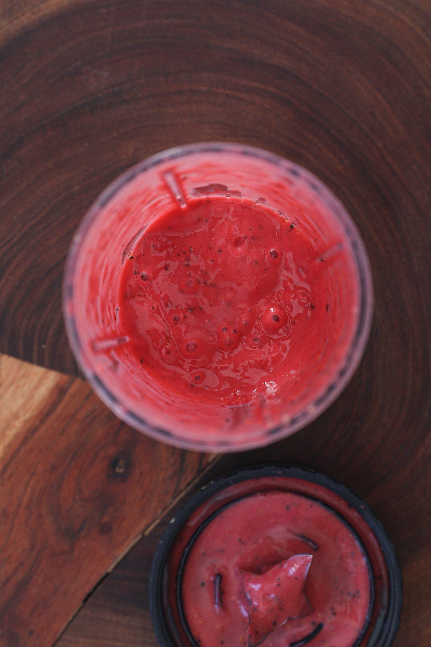 Birdseye view of a red sauce in a bowl.