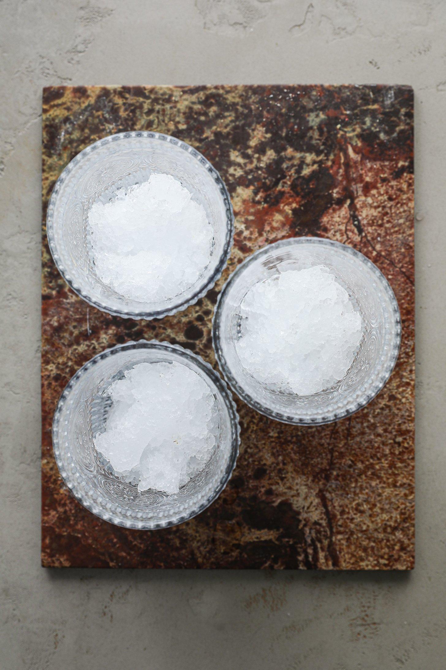An image of 3 glasses with crushed ice.