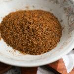 Bombay chaat masala spice mix in a small patterned bowl.